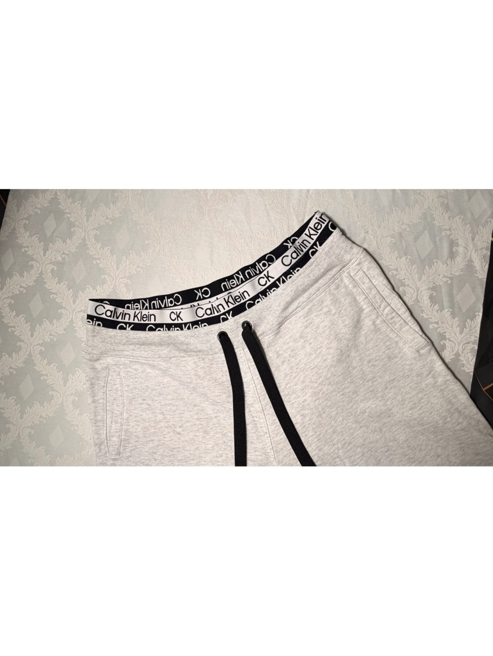 Calvin Light Gray Jogger Sweatpants with Logo Waistband and Black Drawstrings,